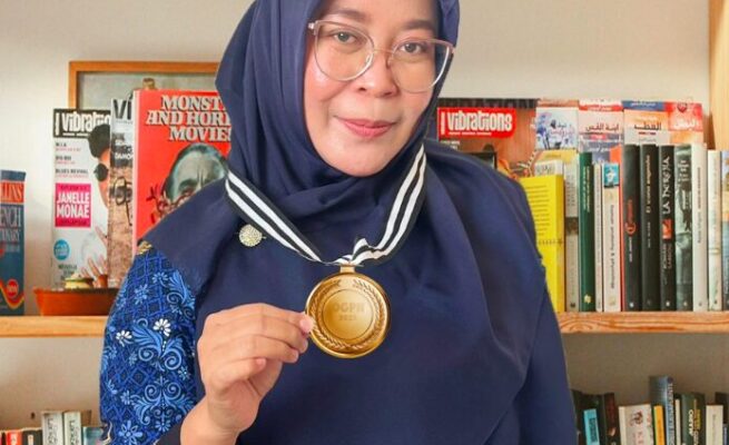 Guru SMPN 3 Banda Aceh Raih Medali Emas Olimpiade Nasional 2025